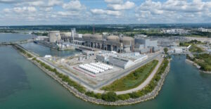Above view of an Industrial Plant by the water.